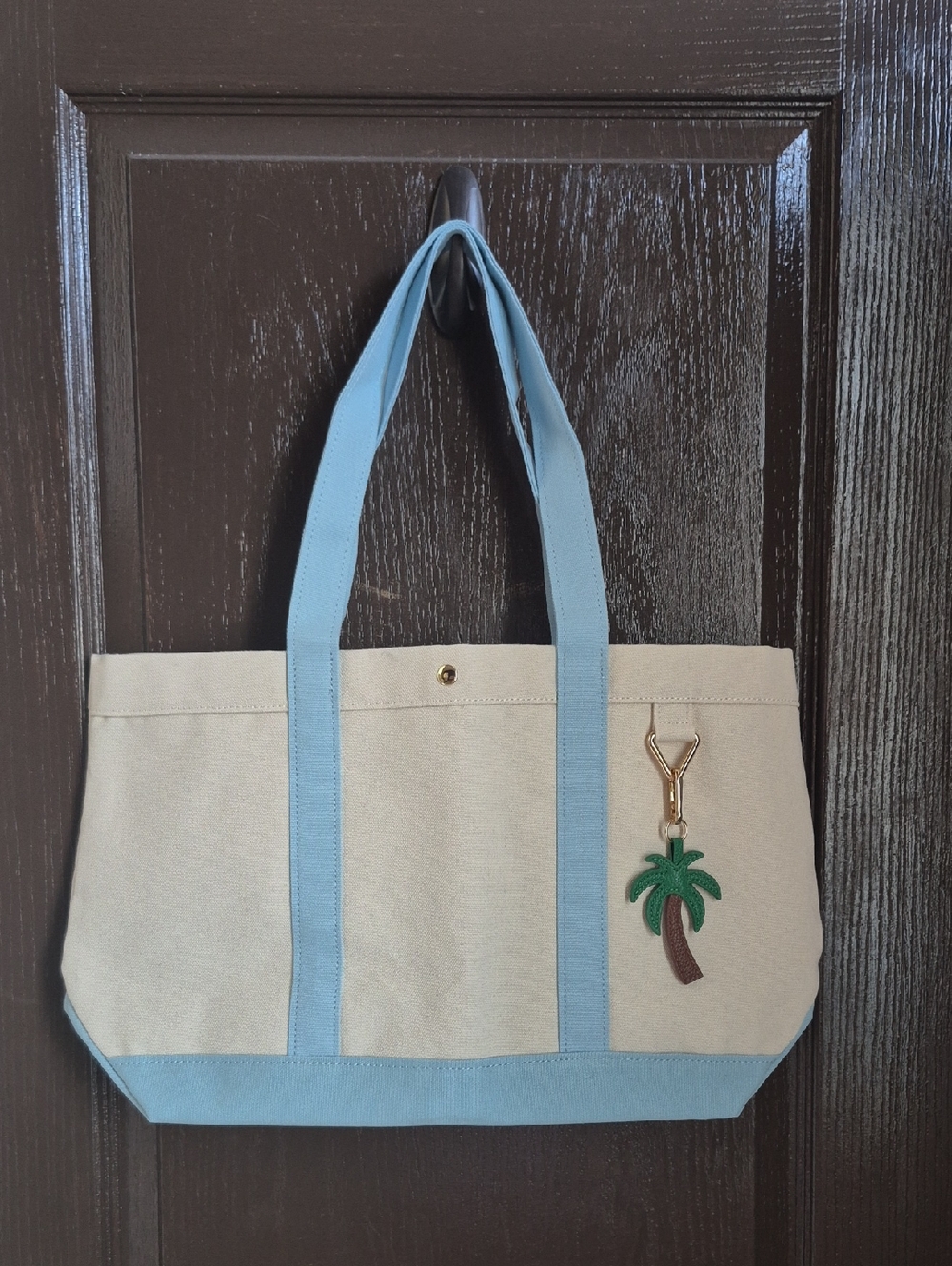 BaubleBar Canvas Tote with Light Blue Trim and Palm Tree Charm